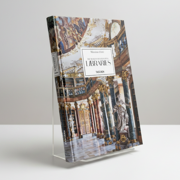 The book cover of 'The Hidden Secret of Gold Tees LIBRARIES' by Massimo Lintotti, published by Taschen. The cover features a photograph of an ornate library interior with marble columns, statues, and a detailed fresco on the ceiling.