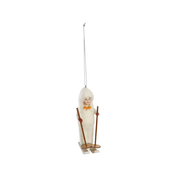 RESIN VINTAGE REPRODUCTION CHILD SKIING ORNAMENT